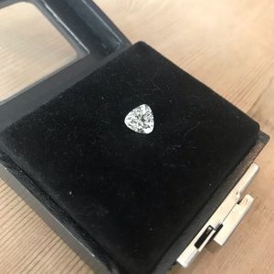 7mm trillion, near colorless CZ loose stone..